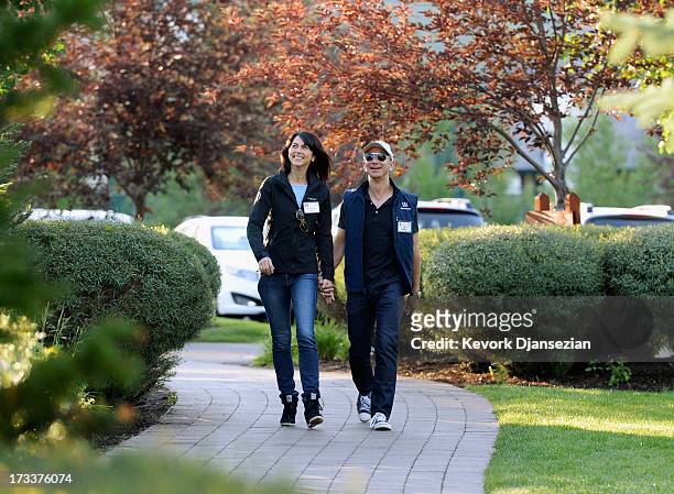 Jeff Bezos, founder and CEO Amazon.com, and his wife Mackenzie Bezos arrives for the Allen & Co., arrives to the Allen & Co. Annual conference July...