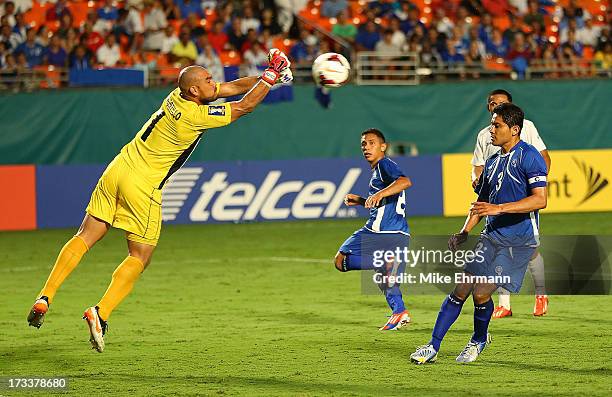 Dagoberto Portillo Gamero of EL Salvador makes a save against Rony Martinez Almendarez of Honduras during a CONCACAF Gold Cup game at Sun Life...