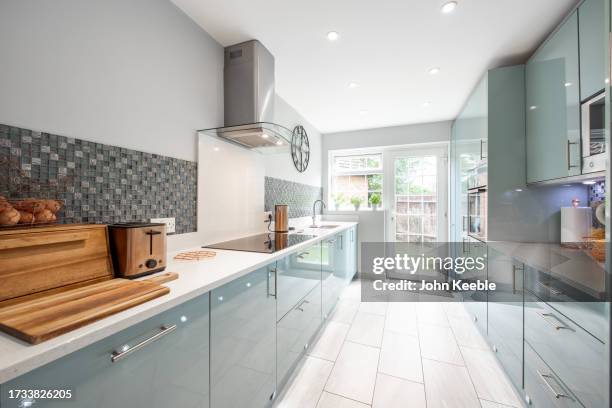 property interiors - narrow kitchen stock pictures, royalty-free photos & images