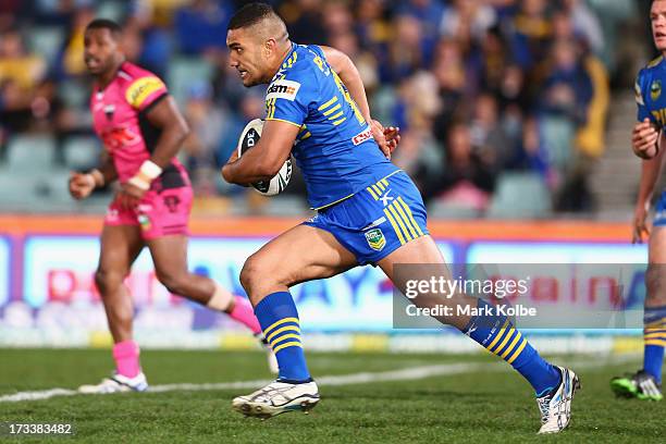 Peni Terepo of the Eels runs the ball during the round 18 NRL match between Parramatta Eels and the Penrith Panthers at Parramatta Stadium on July...