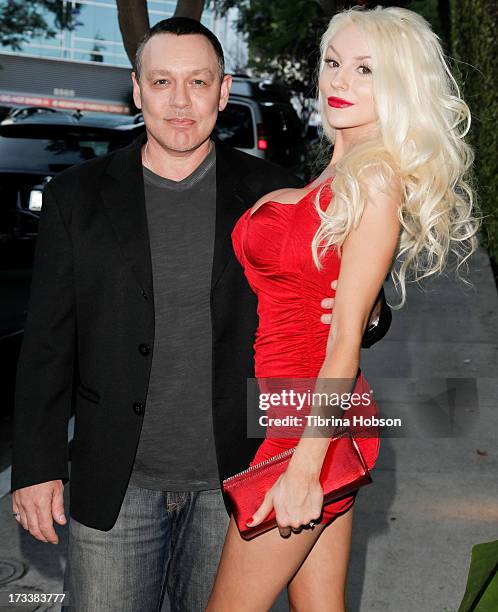 Doug Hutchison and Courtney Stodden attend the 'Dave Stewart: Jumpin' Jack Flash & The Suicide Blonde' photo exhibition at Morrison Hotel Gallery on...