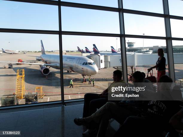 Russian Aeroflot plane as seen through a window of Sheremetyevo airport on July 13, 2012 in Moscow, Russia. Snowden is still believed to have been...