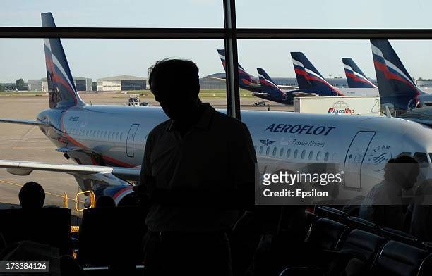 Russian Aeroflot plane as seen through a window of Sheremetyevo airport on July 13, 2012 in Moscow, Russia. Snowden is still believed to have been...