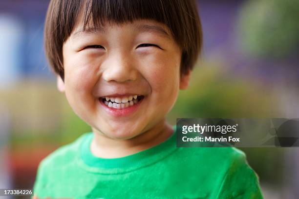japanese boy's big smile - one person smile outdoors stock-fotos und bilder