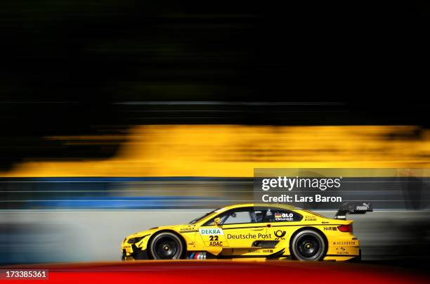 Timo Glock of Germany and BMW Team MTEK drives during the training session ahead of qualifying for the fifth round of the DTM 2013 German Touring Car...