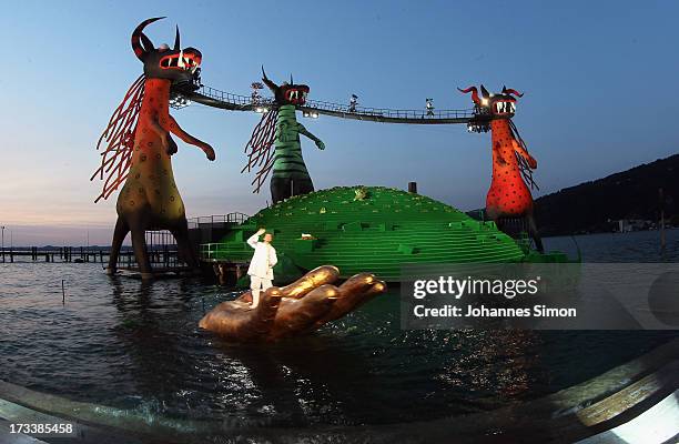 Opera singers Rainer Trost performs on the floating stage during the rehearsal of the opera 'Die Zauberfloete' of Austrian composer Wolfgang Amadeus...