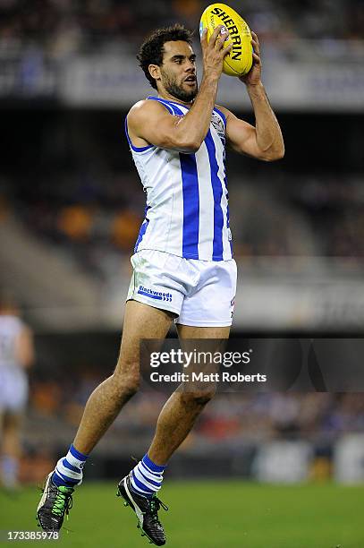 Daniel Wells of the Kangaroos marks during the round 16 AFL match between the Brisbane Lions and the North Melbourne Kangaroos at The Gabba on July...