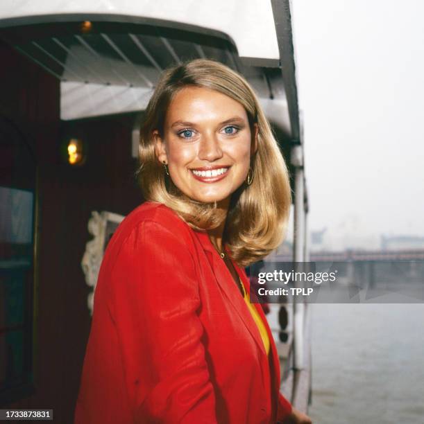 Portrait of Welsh television host and journalist Anneka Rice as she poses on a boat, London, England, September 29, 1983.