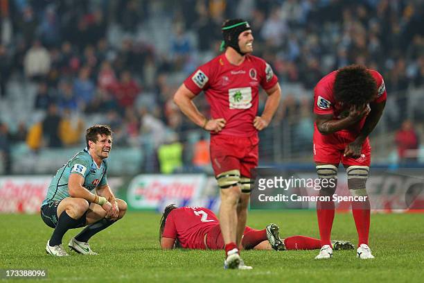 Berrick Barnes of the Waratahs reacts after missing a field goal during the round 20 Super Rugby match between the Waratahs and the Reds at ANZ...
