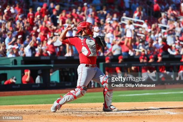 Luke Maile of the Cincinnati Reds throws against the St. Louis Cardinals at Busch Stadium on October 1, 2023 in St Louis, Missouri.