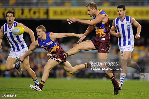Joel Patfull of the Lions kicks during the round 16 AFL match between the Brisbane Lions and the North Melbourne Kangaroos at The Gabba on July 13,...