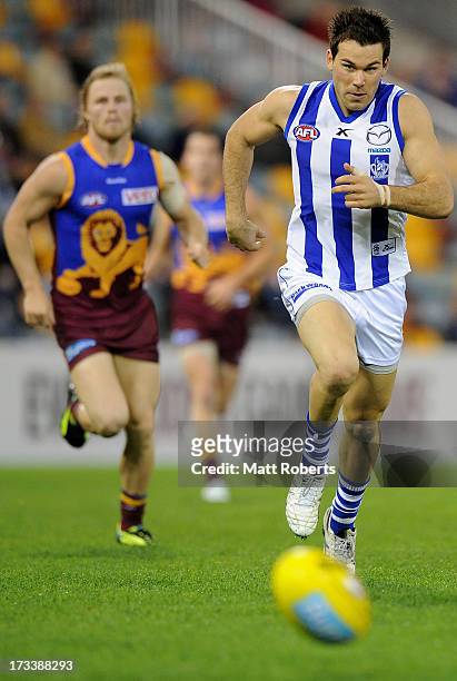 Levi Greenwood of the Kangaroos comepetes for the ball during the round 16 AFL match between the Brisbane Lions and the North Melbourne Kangaroos at...