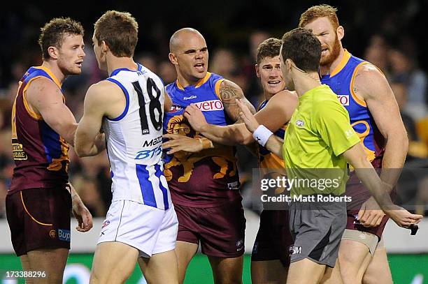 Ashley McGrath of the Lions reacts to the referee during the round 16 AFL match between the Brisbane Lions and the North Melbourne Kangaroos at The...