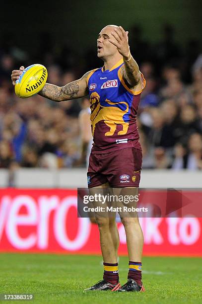 Ashley McGrath of the Lions reacts during the round 16 AFL match between the Brisbane Lions and the North Melbourne Kangaroos at The Gabba on July...