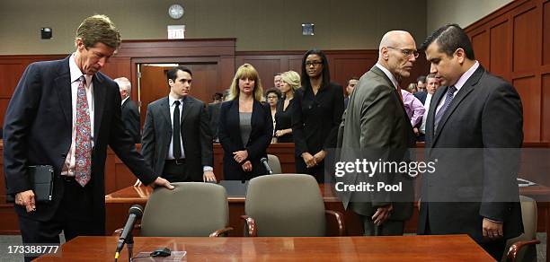 George Zimmerman arrives with his defense team, Mark O'Mara and Don West , waiting for the jury to return from deliberations in Seminole circuit...