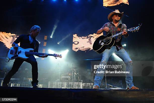 Jason Aldean performs during the Night Train Tour 2013 at Fenway Park on July 20, 2013 in Boston, Massachusetts.