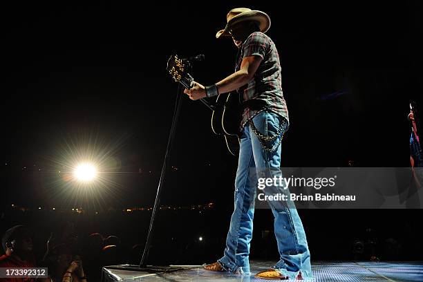 Jason Aldean performs during the Night Train Tour 2013 at Fenway Park on July 20, 2013 in Boston, Massachusetts.