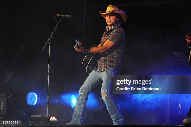 Jason Aldean performs during the Night Train Tour 2013 at Fenway Park on July 20, 2013 in Boston, Massachusetts.