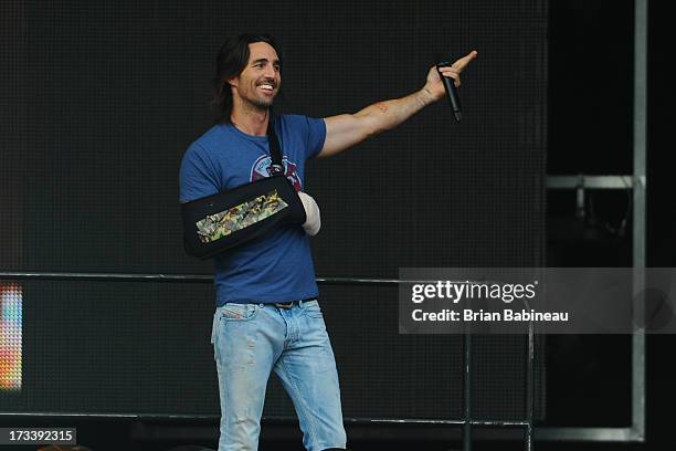 Jake Owen performs during the Night Train Tour 2013 at Fenway Park on July 20, 2013 in Boston, Massachusetts.