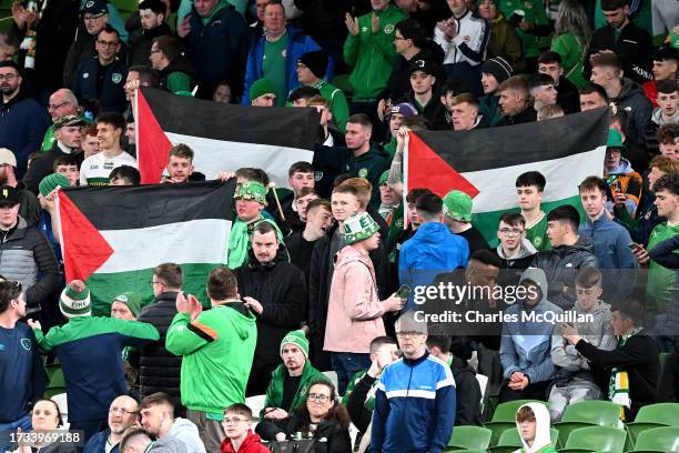 Palestine flags are displayed in the stands during the UEFA EURO 2024 European qualifier match between Republic of Ireland and Greece at Aviva...