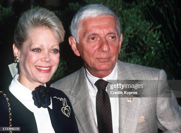 American producer Aaron Spelling with his wife, author Candy Spelling, circa 1990.