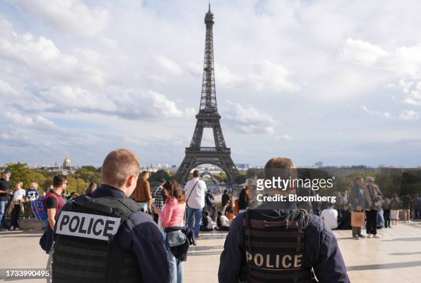 French police officers patrol near the Eiffel Tower in central Paris, France, on Thursday, Oct. 19, 2023. As home to both the largest Jewish and...