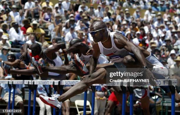 Allen Johnson of the US clears the hurdle during the Men's 110 Meters Hurdles qualifying at the US Olympic Track and Field Team Trials 17 July 2004...