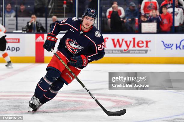 Jake Bean of the Columbus Blue Jackets warms up prior to the Columbus Blue Jackets home opener against the Philadelphia Flyers at Nationwide Arena on...