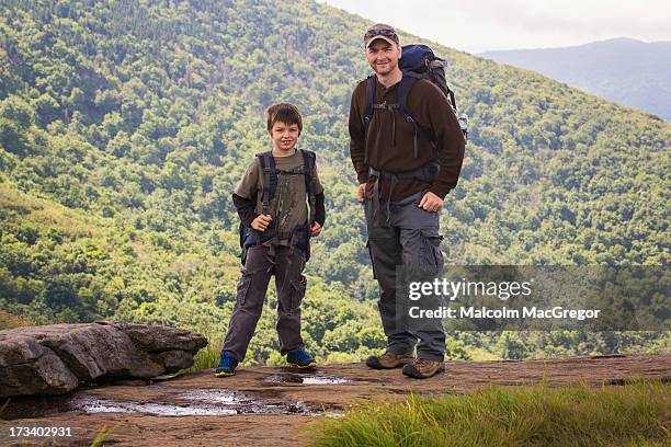 father and son hiking - 長袖 ストックフォトと画像