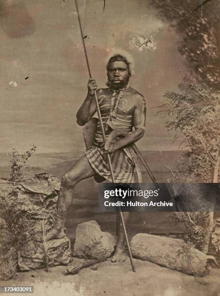 An Aboriginal Australian hunter in body paint poses, Australia, circa 1880.