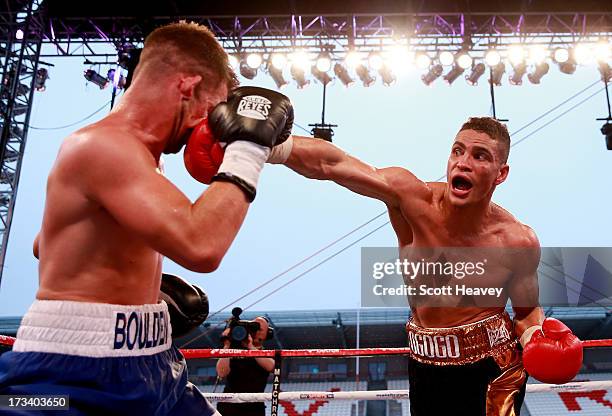 Anthony Ogogo connects with Gary Boulden during their Middleweight bout at Craven Park Stadium on July 13, 2013 in Hull, England.