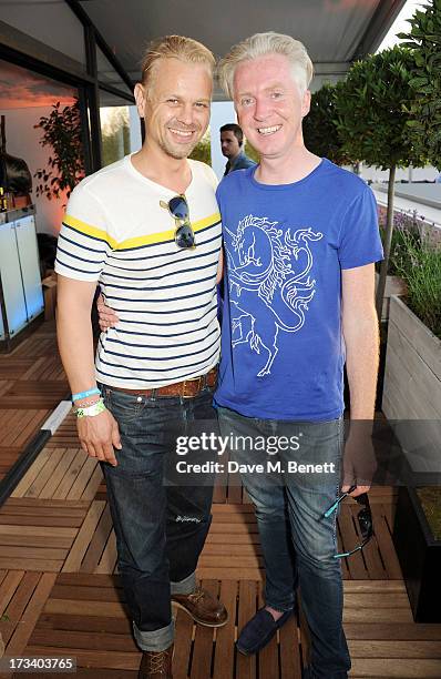 Adrian Fillary and Philip Treacy attend the Barclaycard UNWIND VIP lounge at British Summer Time Hyde Park presented by Barclaycard on July 13, 2013...