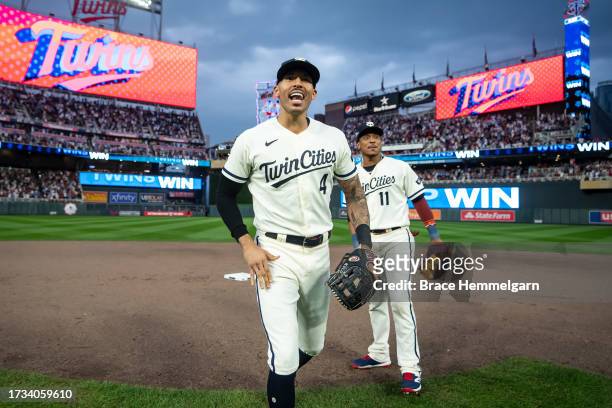 Carlos Correa and Jorge Polanco of the Minnesota Twins celebrate during game one of the Wild Card Series against the Toronto Blue Jays on October 3,...