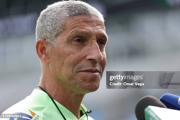 Head coach of Ghana Chris Hughton speaks to the media during a mix zone ahead of the friendly martch against Mexico at Bank of America Stadium on...