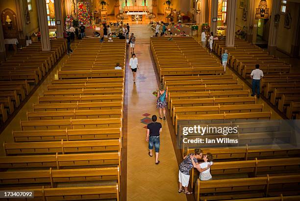 Residents of Lac-Megantic gather and pray at the Presbyteres-Eglises Catholique July 13, 2013 in Lac-Megantic, Quebec, Canada. A train derailed and...