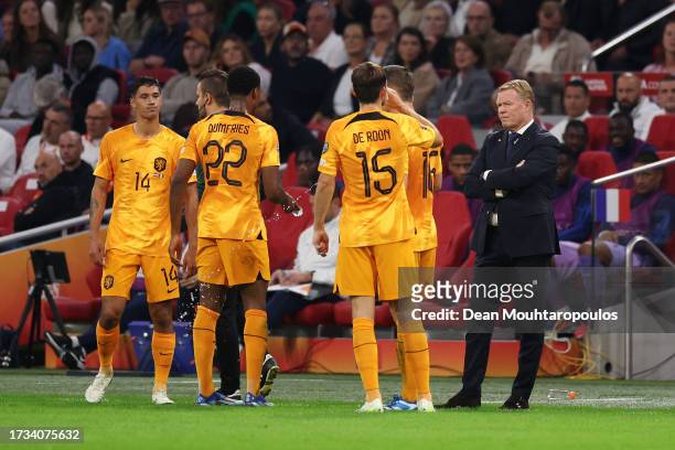 Ronald Koeman, Head Coach of Netherlands, interacts with his players during the UEFA EURO 2024 European qualifier match between Netherlands and...