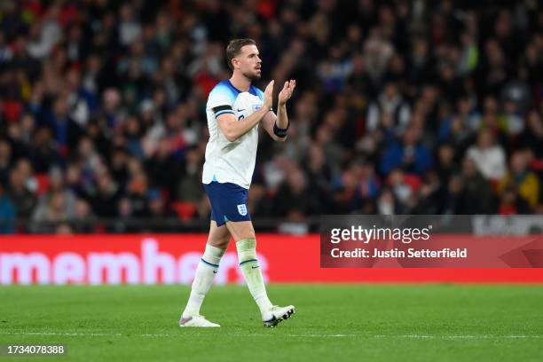 Jordan Henderson of England applauds the fans as they are substituted off during the international friendly match between England and Australia at...