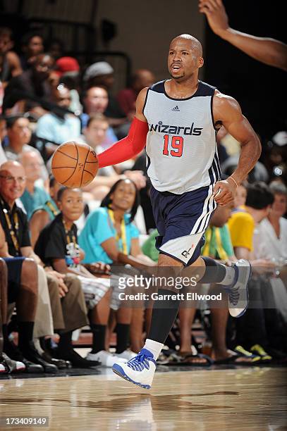 Sundiata Gaines of the Washington Wizards dribbles up the court against the Golden State Warriors during NBA Summer League on July 13, 2013 at the...