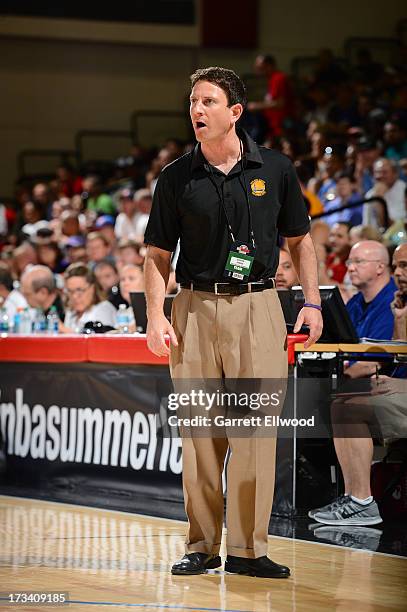 Darren Erman Head Coach of the Golden State Warriors gives direction against the Washington Wizards during NBA Summer League on July 13, 2013 at the...