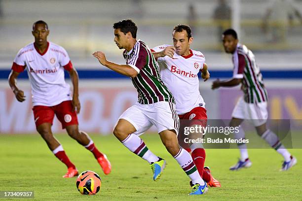 Jean of Fluminense fights for the ball during the match between Fluminense and Internacional a as part of Brazilian Championship 2013 at Moacyrzao...