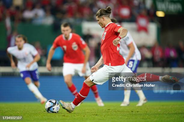 Marcel Sabitzer of Austria scores the team's second goal from the penalty spot during the UEFA EURO 2024 European qualifier match between Austria and...