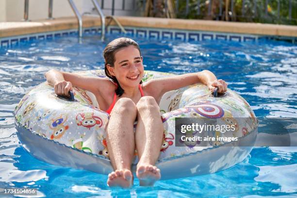 Tween Floating Inpool Teenager Girl Enjoy Floating In Inflatable Ring On Water Outdoors ...