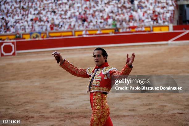 Bullfighter Ivan Fandino celebrates his performance with a Fuente Ymbro's fighting bull on the eighth day of the San Fermin Running Of The Bulls...