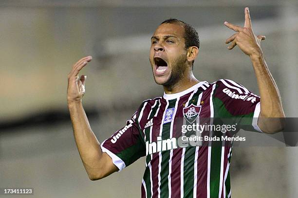 Carlinhos of Fluminense celebrates a scored goal during the match between Fluminense and Internacional a as part of Brazilian Championship 2013 at...