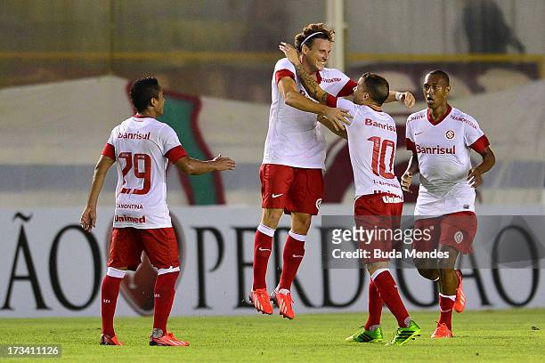 Diego Forlan of Internacional celebrates a scored goal during the match between Fluminense and Internacional a as part of Brazilian Championship 2013...