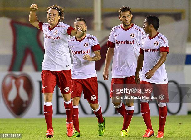 Diego Forlan of Internacional celebrates a scored goal during the match between Fluminense and Internacional a as part of Brazilian Championship 2013...