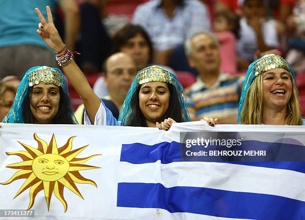 Uruguay's fans hold their national flag prior to their final football match against France at the FIFA Under 20 World Cup at Turk Telecom stadium in...