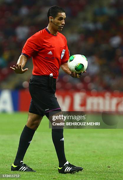 Mexican referee Roberto Garcia holds a ball during the final football match between France and Uruguay at the FIFA Under 20 World Cup at Turk Telecom...