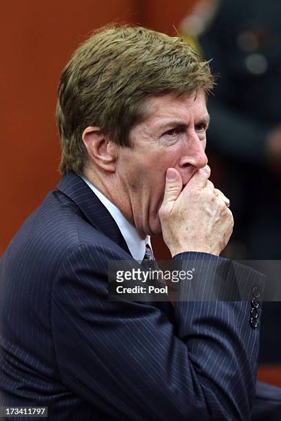 Defense counsel Mark O'Mara stifles a yawn during a reconvening in the courtroom for a jury question on the 25th day of George Zimmerman's trial at...