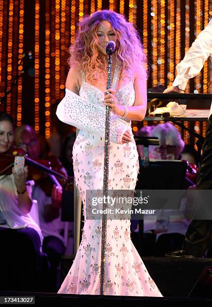 Mariah Carey performs on stage during MLB All Star Charity Concert starring The New York Philharmonic with Special Guest Mariah Carey Benefiting...